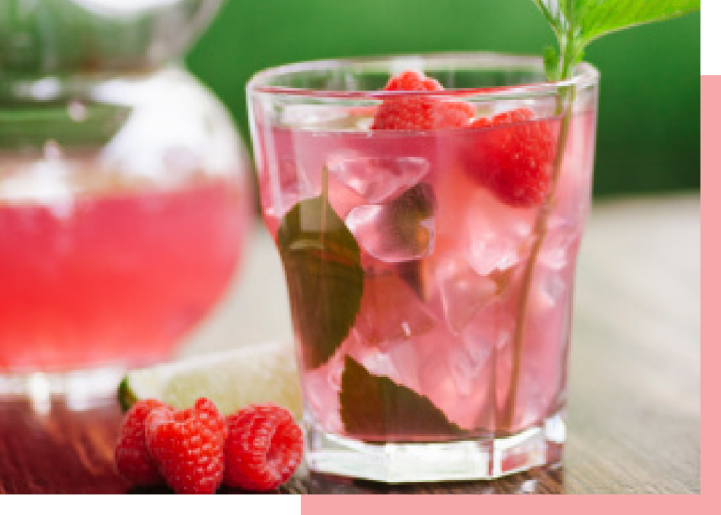 Raspberry & Elderflower cocktail with fresh raspberries and mint leaves