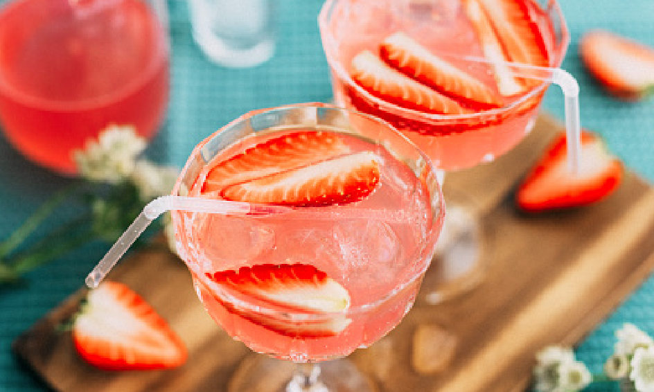 Bright strawberry cocktails with straw